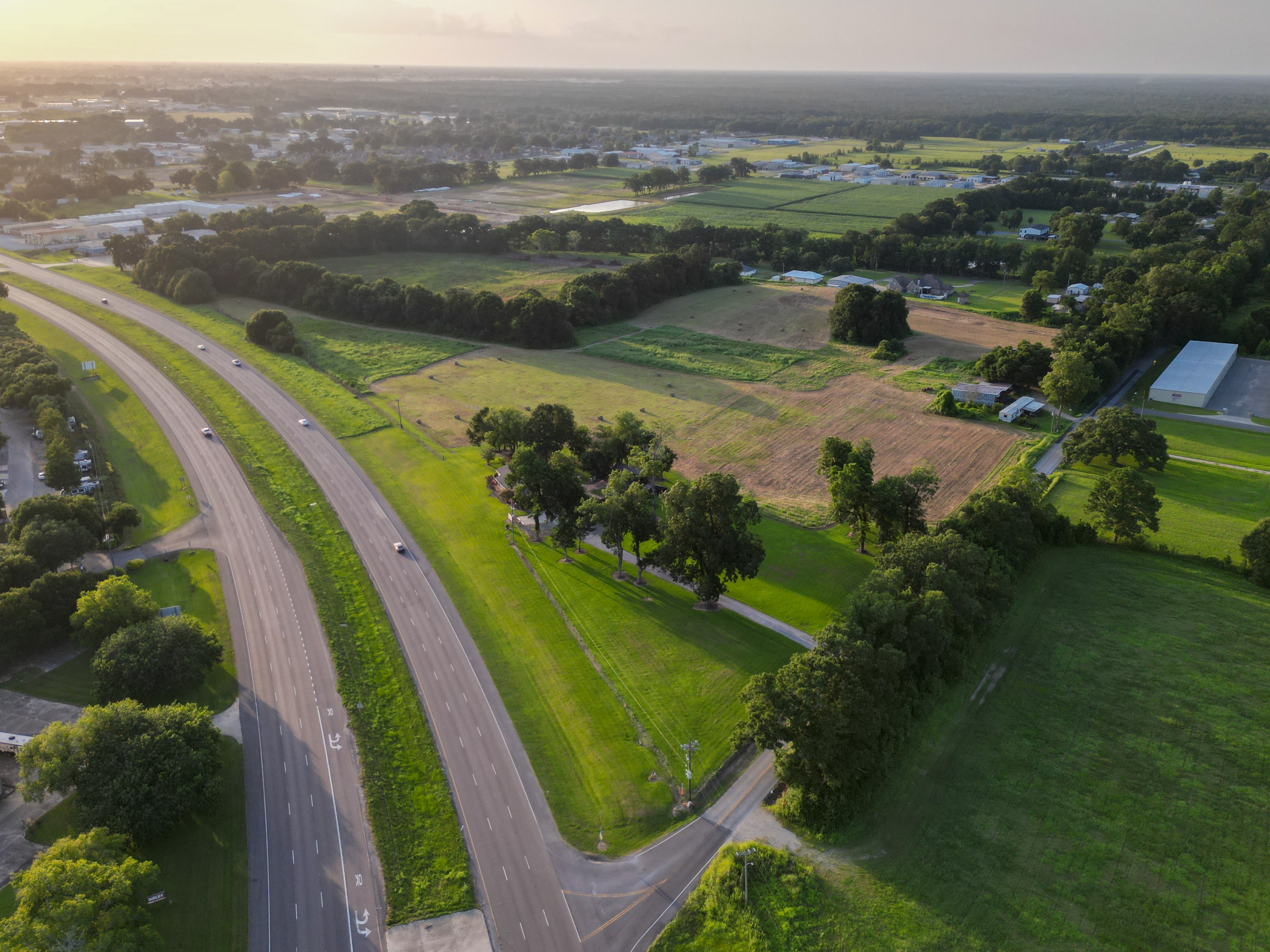 Aerial view of the property with US Hwy 90 at golden hour